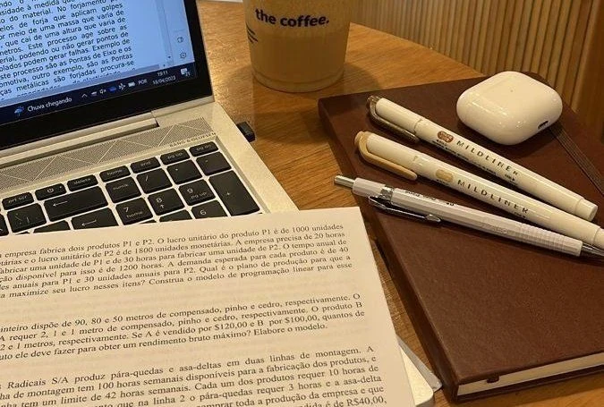 a lap and some study tools are shown