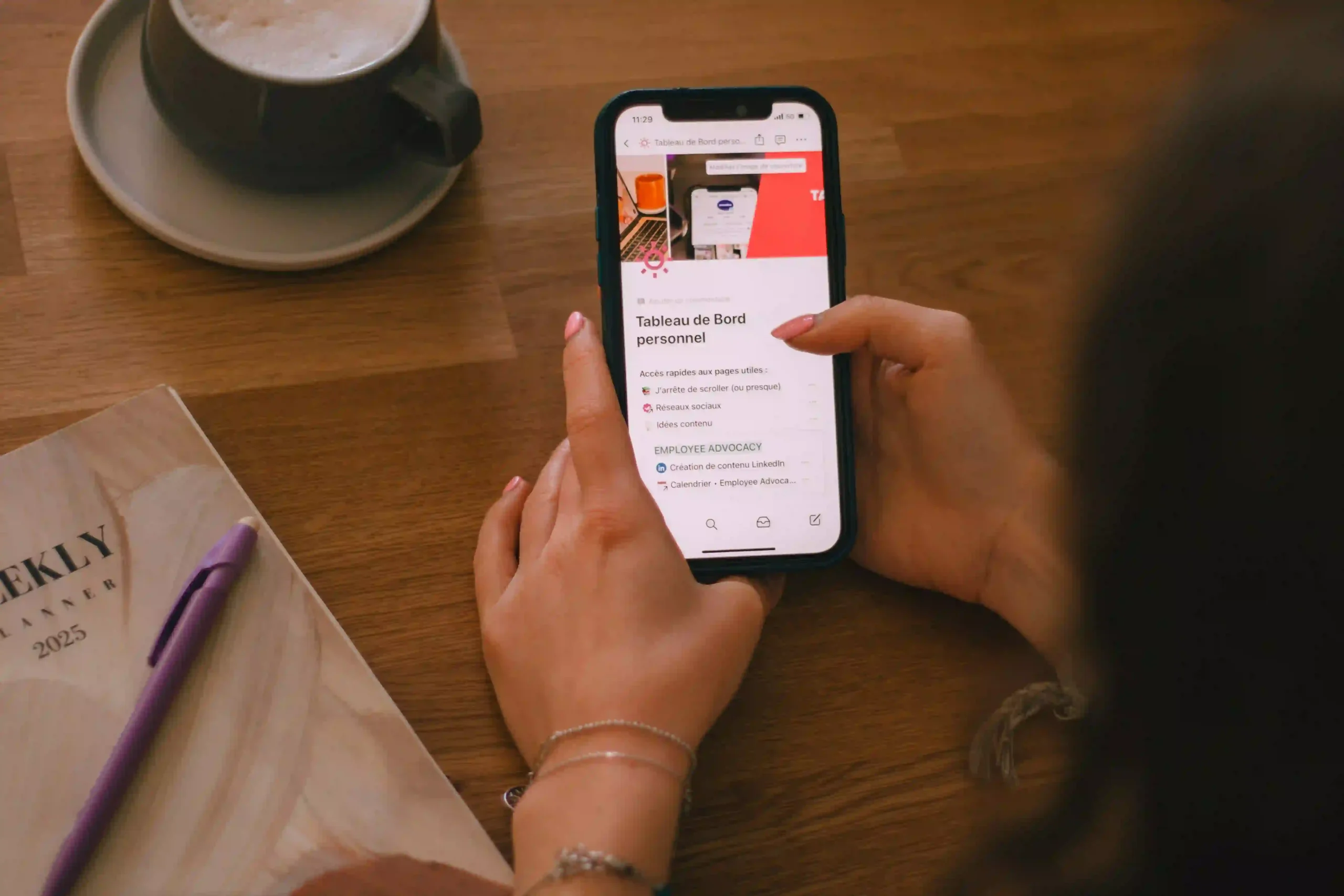 a lady is looking on a mobile